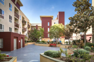 Castelar exterior, walking path, benches, trees and greenery