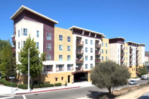 Castelar Exterior with balconies, sidewalk, and street