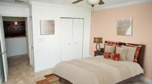 bright bedroom with closet