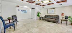 harbour pointe sign in lobby, couch area