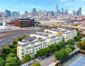 Crescent Cove aerial view with cityscape in background