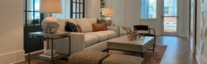 avion point community living area, couches, neutral decor