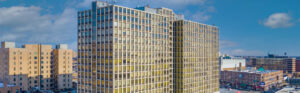Exterior Lincoln Park Plaza, Aerial view Residential building and surrounding area, photo taken on a sunny day with clouds
