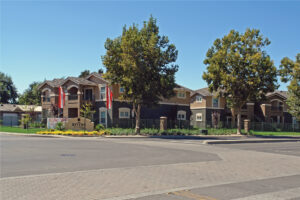 Exterior Rivers Senior Front signage, Meticulous landscaping, photo taken on a sunny day.