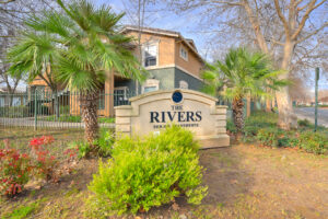 Exterior Rivers Senior front signage, meticulous landscaping.