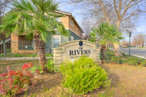 Exterior Rivers Senior front signage, meticulous landscaping.